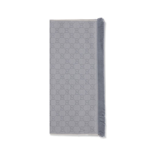 Scarf by Gucci for women in wool gray showcases a warm silhouette from the Gg Grace Wool Wrap Frayed-Edge Scarf collection, offering a warm drape that exudes sophisticated luxury.