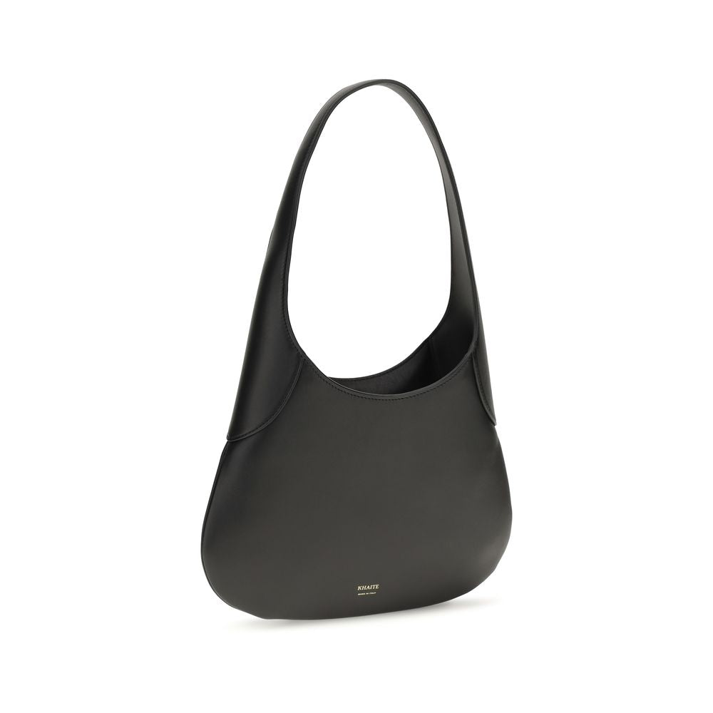 Small Shoulder Hobo Handbag by Khaite for women in bos taurus calfskin leather black & gold presents a ornamental silhouette, showcasing a secure , ample , and versatile shoulder-strap for a ornamental finish.