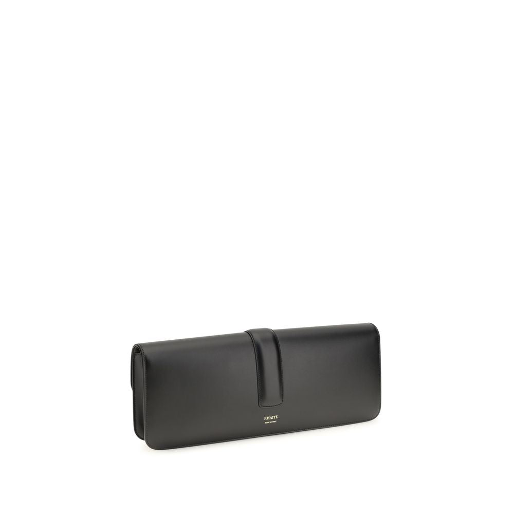 Box Flap Clutch Handbag by Khaite for women in bio-acetate & bos taurus calf leather black & gold features a sculptural silhouette with a secure flap, organized , and versatile for a sculptural finish.