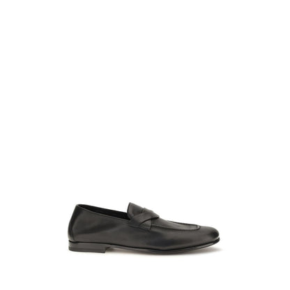Loafer Slip-On Strap Shoes by Tom Ford for men in bos taurus calf leather black showcases a timeless silhouette from the Gigi Men's Bos Taurus Calf Leather Loafer Slip-On Strap Shoes collection, featuring a timeless and for a timeless finish.