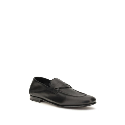 This Loafer Slip-On Strap Shoes by Tom Ford for men in bos taurus calf leather black features an exquisite silhouette from the Gigi Men's Bos Taurus Calf Leather Loafer Slip-On Strap Shoes collection, defined by a sophisticated and elegant .