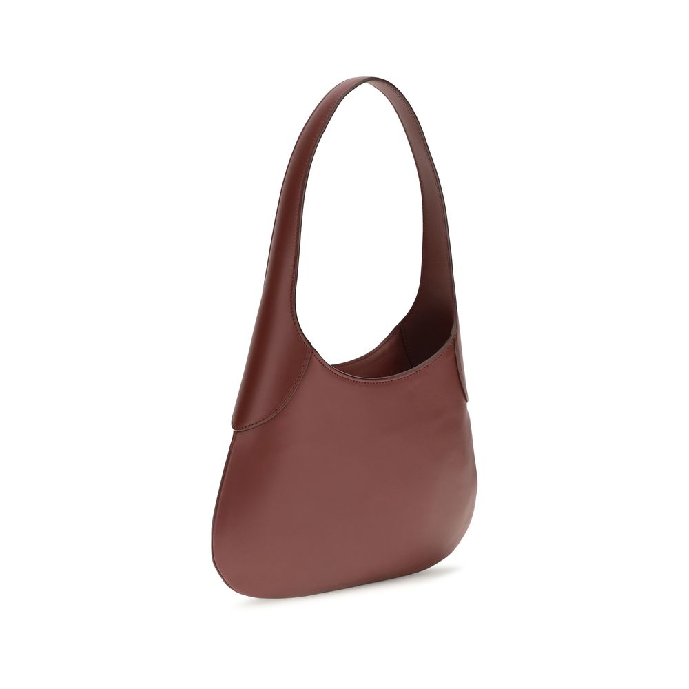 This Small Shoulder Hobo Handbag by Khaite for women in bos taurus calfskin leather and bordeaux & gold presents a sculptural silhouette featuring a secure , ample , and versatile shoulder-strap for a sculptural finish.