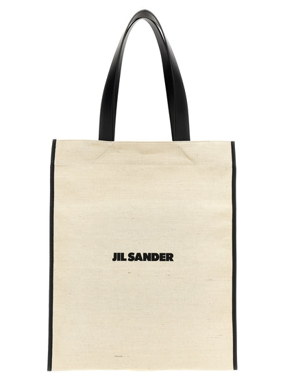 Medium Shopper Tote Bag by Jil Sander for men in leather virgin wool & nylon bicolour, black & white features an jet-set Leather Virgin Wool & Nylon Medium Shopper Tote Bag design with a secure , ample , and versatile for an jet-set finish.
