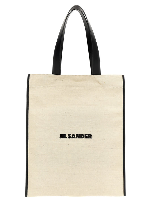 Medium Shopper Tote Bag by Jil Sander for men in leather virgin wool & nylon bicolour, black & white features an jet-set Leather Virgin Wool & Nylon Medium Shopper Tote Bag design with a secure , ample , and versatile for an jet-set finish.
