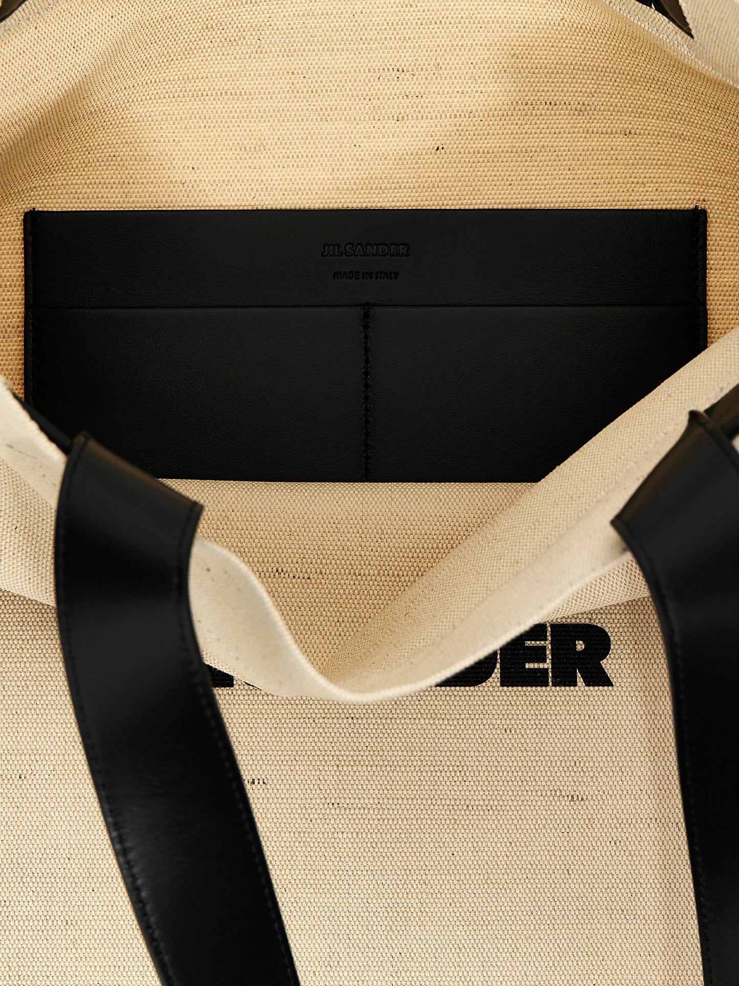 Medium Shopper Tote Bag by Jil Sander for women in cotton polyester & horn bicolour, black, white & print features a jet-set sophisticated Cotton Polyester & Horn Medium Shopper Tote Bag design with a secure , ample , and versatile handle for a jet-set sophisticated finish.