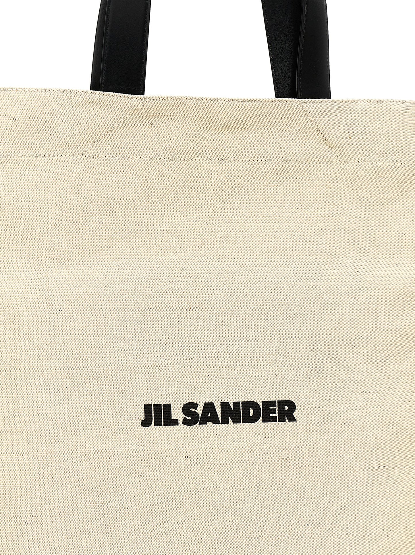 Medium Shopper Tote Bag by Jil Sander for men in leather virgin wool & nylon bicolour, black & white features an jet-set-ready silhouette, showcasing the Leather Virgin Wool & Nylon Medium Shopper Tote Bag design with a secure , ample , and versatile .