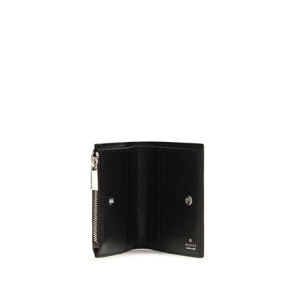 Cardholder Wallet by Gucci for women in raffia & leather black & palladium showcases a enchanting silhouette, artfully detailed with the signature style of the Gg Raffia & Leather Cardholder Wallet and functional card-organization compact-design.