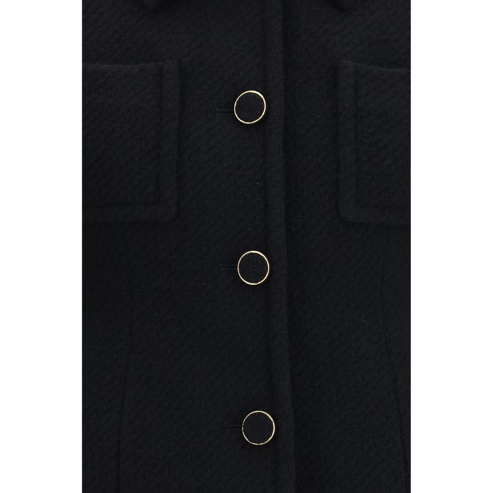 Blazer by Chloé for women in polyamide merino wool tweed black showcases a discerning silhouette, elegantly detailed with a sophisticated and premium for a truly discerning finish.