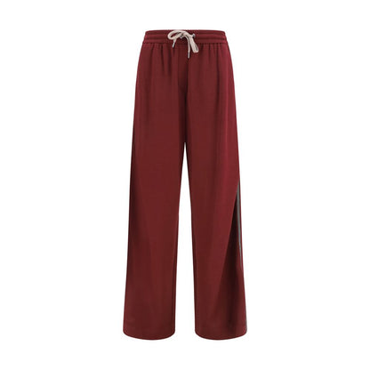 Track Pants by Brunello Cucinelli for women in polyamide silk & cotton bordeaux features an contemporary straight-leg, athletic, relaxed-fit & regular-fit with a long and , showcasing for a contemporary finish.
