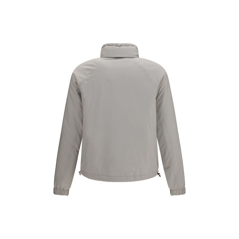 Hooded Windbreaker Jacket by Brunello Cucinelli for men in polyester gray showcases a urban chic silhouette, detailed with a urban chic hooded neckline and functional water-resistant, pockets, hooded & windproof for a polished finish.