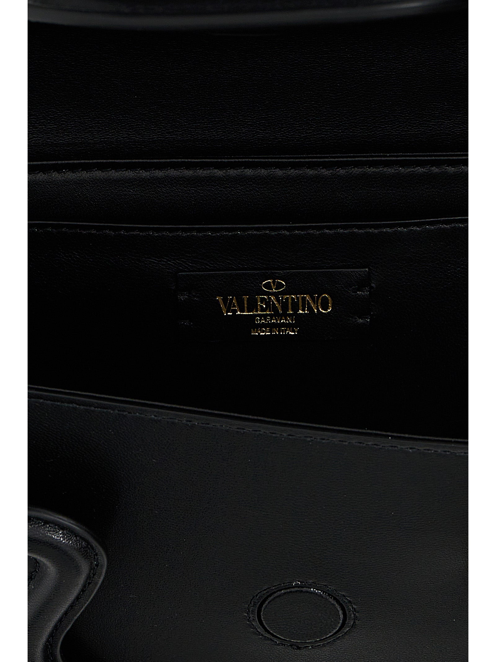 Shoulder Flap Bag by Valentino Garavani for women in leather & metal black & signature presents a statuesque silhouette, showcasing a secure flap & magnetic and statuesque with versatile shoulder-strap, adjustable-strap & handle for a sophisticated look.