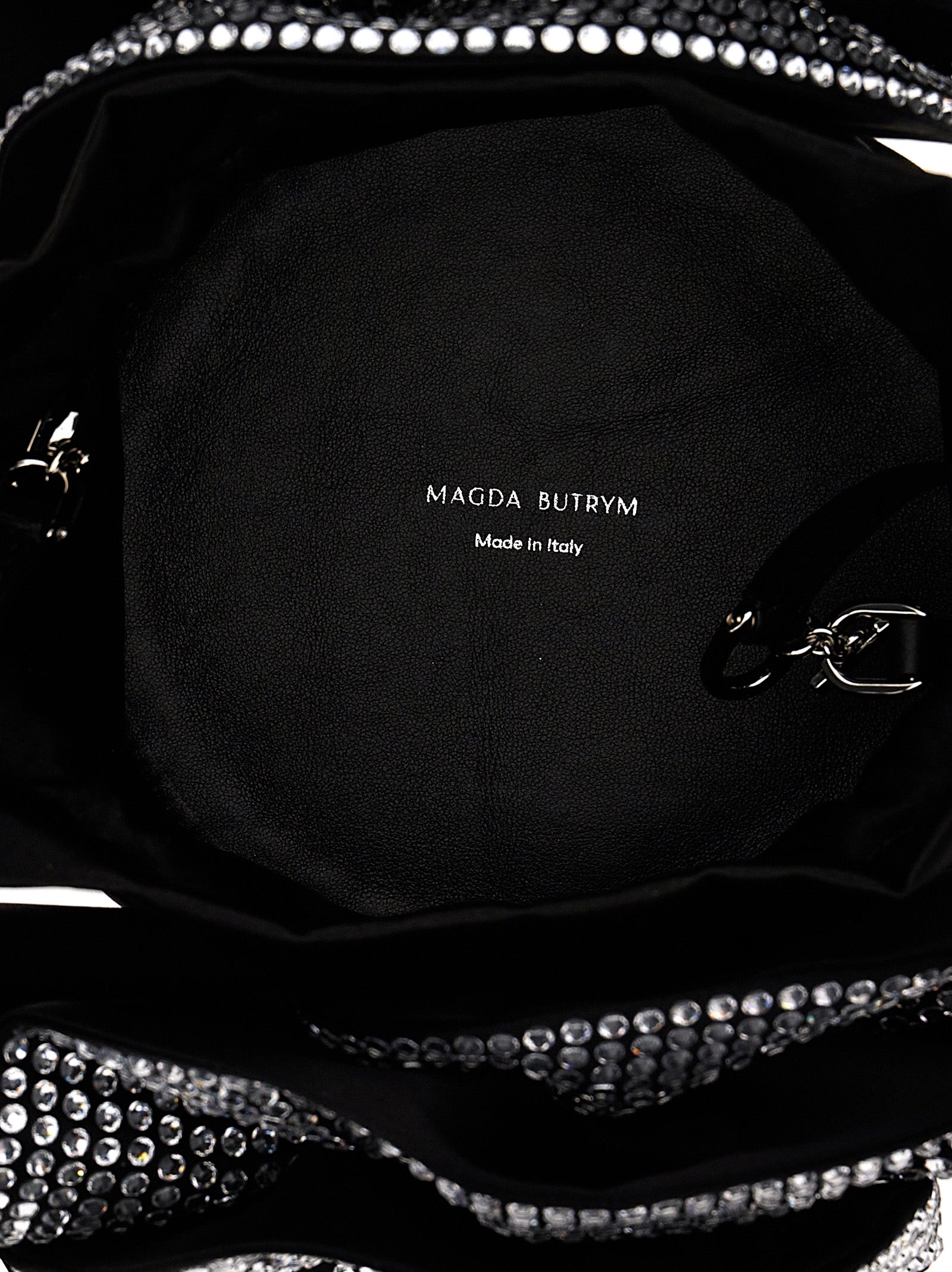 Crossbody Drawstring Handbag by Magda Butrym for women in leather & satin black features a transformative sophistication silhouette, showcasing a secure drawstring, ample , and versatile crossbody-strap, shoulder-strap & adjustable-strap for a transformative sophistication look.