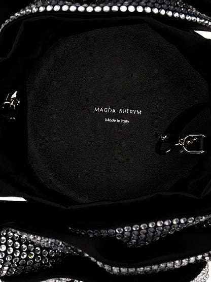 Crossbody Drawstring Handbag by Magda Butrym for women in leather & satin black features a transformative sophistication silhouette, showcasing a secure drawstring, ample , and versatile crossbody-strap, shoulder-strap & adjustable-strap for a transformative sophistication look.