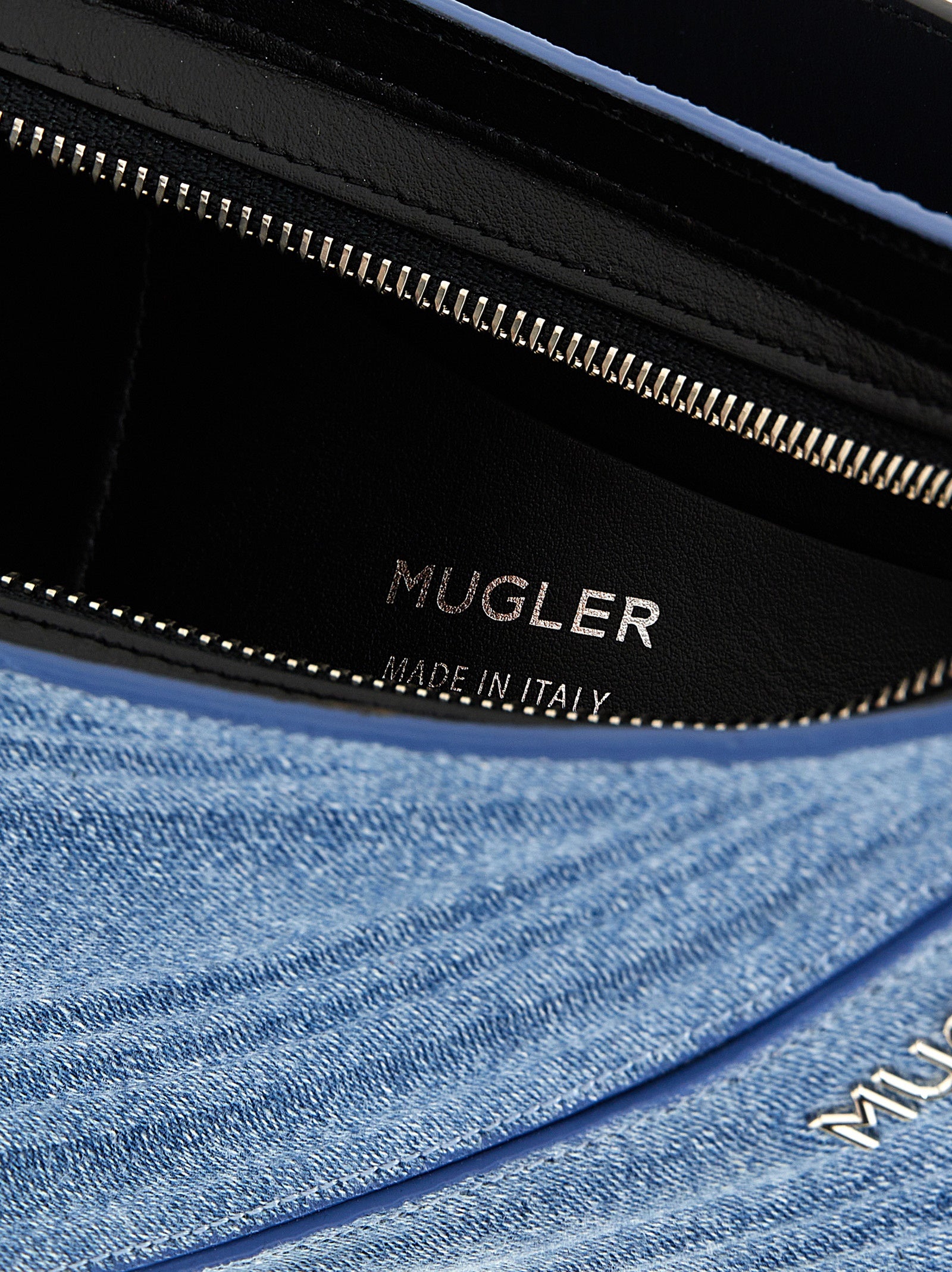 Medium Shoulder Bag by Mugler for women in calfskin leather blue features a effortless chic silhouette with a secure zipper, ample , and versatile shoulder-strap, adjustable-strap & handle for a effortless chic finish.