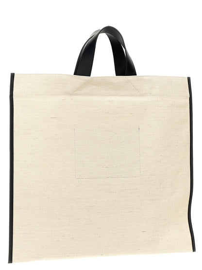 Shopper Tote Bag by Jil Sander for women in cotton polyester canvas bicolour, black, white & print showcases a statuesque Cotton Polyester Canvas Shopper Tote Bag design, featuring a secure , ample , and versatile handle for a statuesque finish.