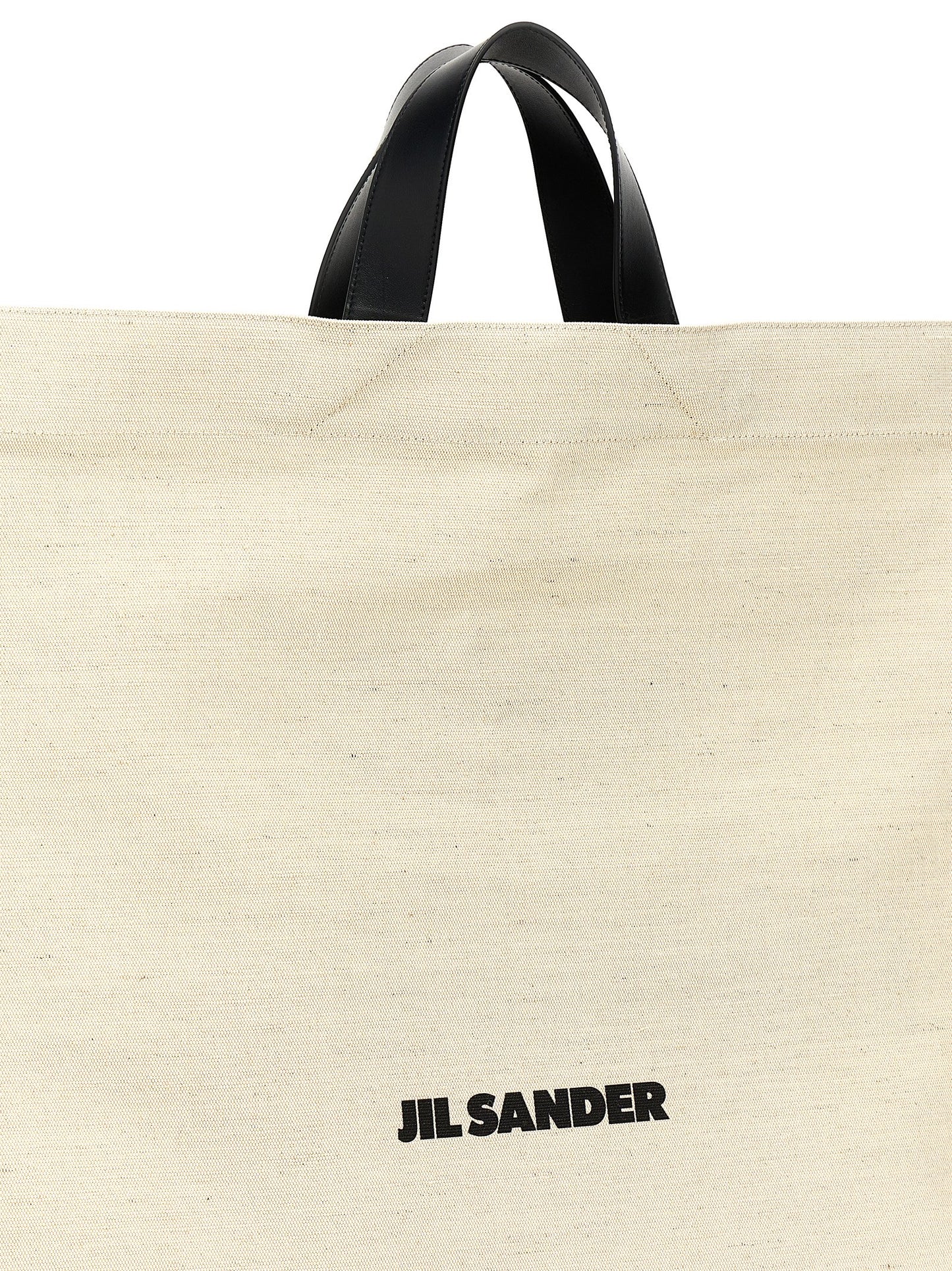 Shopper Tote Bag by Jil Sander for women in cotton polyester canvas bicolour, black, white & print features a jet-set Cotton Polyester Canvas Shopper Tote Bag design, complete with a secure , ample , and versatile handle for a jet-set look.