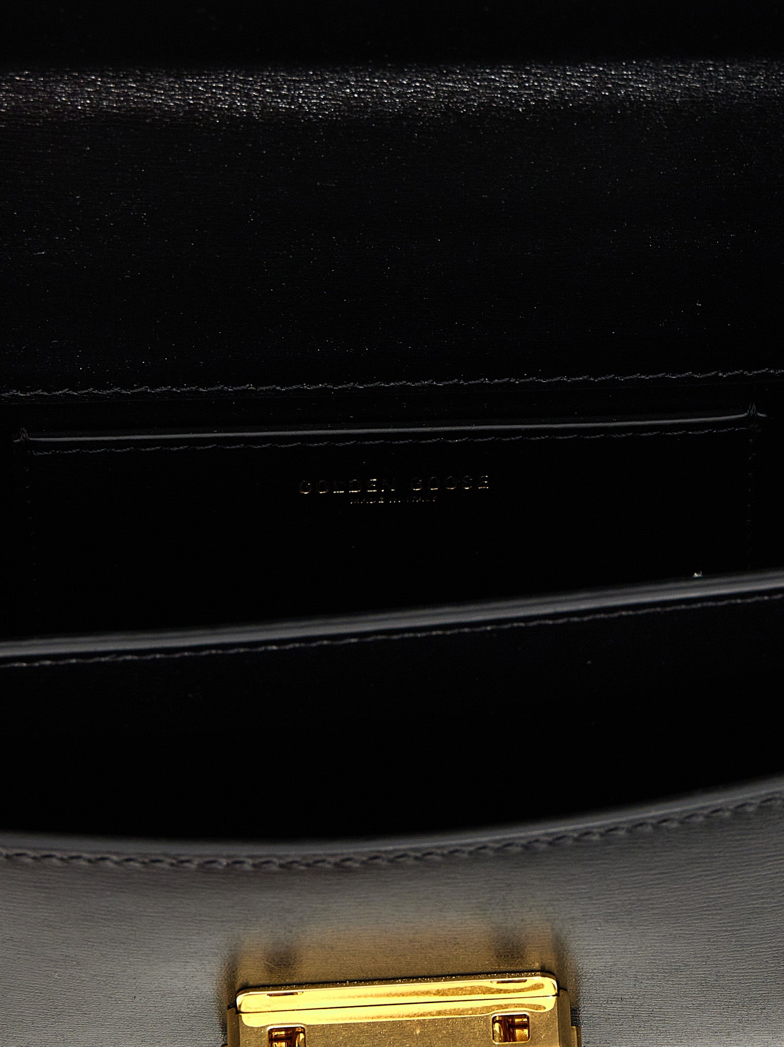 Small Handbag by Golden Goose for women in leather & metal black presents a ornamental silhouette, showcasing a secure clip, ample , and versatile shoulder-strap, handle & adjustable-strap for a ornamental finish.
