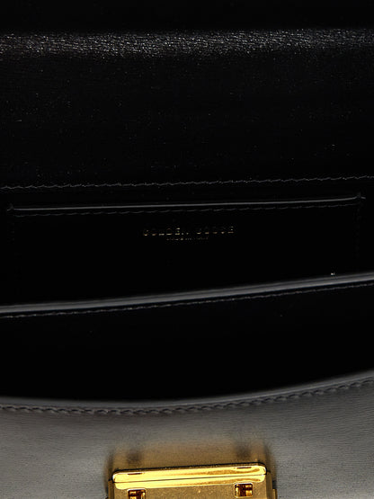 Small Handbag by Golden Goose for women in leather & metal black presents a ornamental silhouette, showcasing a secure clip, ample , and versatile shoulder-strap, handle & adjustable-strap for a ornamental finish.