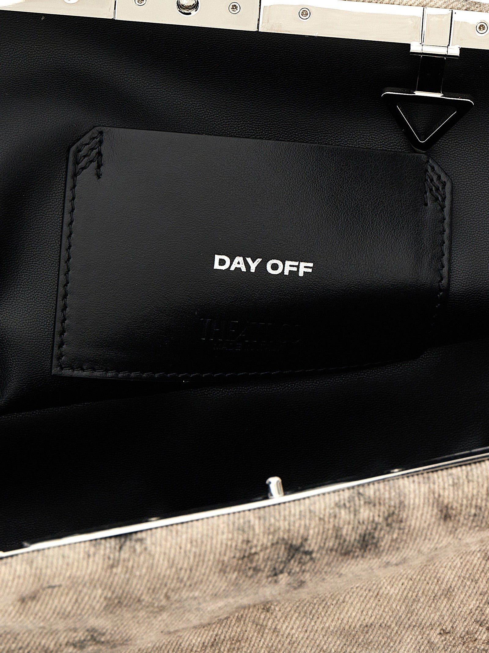 Evening Clutch Handbag by The Attico for women in nappa leather gray showcases a sculptural silhouette, featuring a secure snap, ample , and versatile shoulder-strap & adjustable-strap for a sculptural finish.