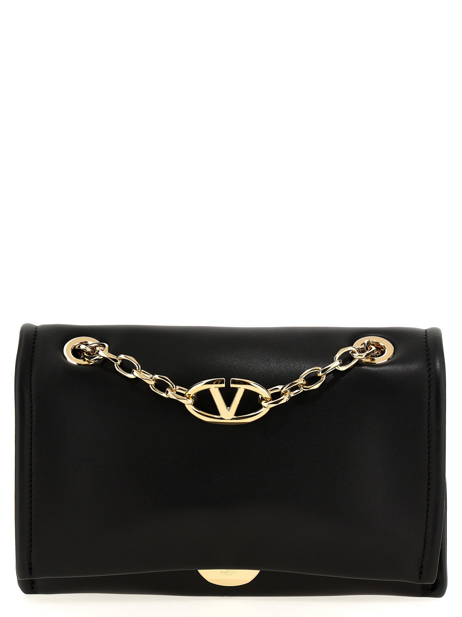 Shoulder Flap Bag by Valentino Garavani for women in lamb leather black showcases a statuesque silhouette, artfully detailed with a secure flap & magnetic, organized , and versatile shoulder-strap & handle for a statuesque look.