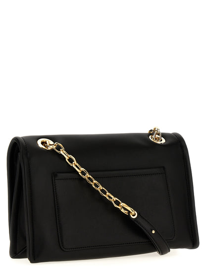Shoulder Flap Bag by Valentino Garavani for women in lamb leather black features a effortless sophistication silhouette, secured by a flap & magnetic with ample and versatile shoulder-strap & handle for a effortless sophistication finish.