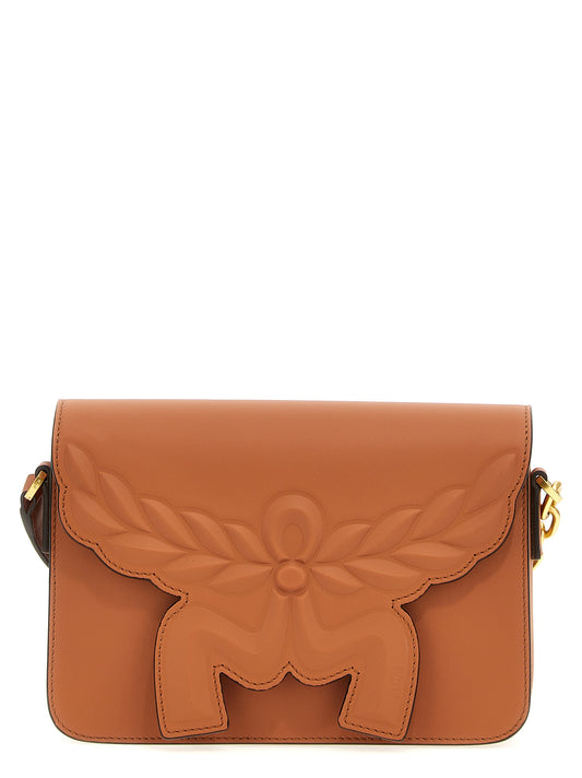 Crossbody Flap Handbag by MCM for women in calfskin leather brown features an versatile silhouette, showcasing a secure flap & magnetic and versatile with versatile crossbody-strap, shoulder-strap & adjustable-strap for a versatile finish.
