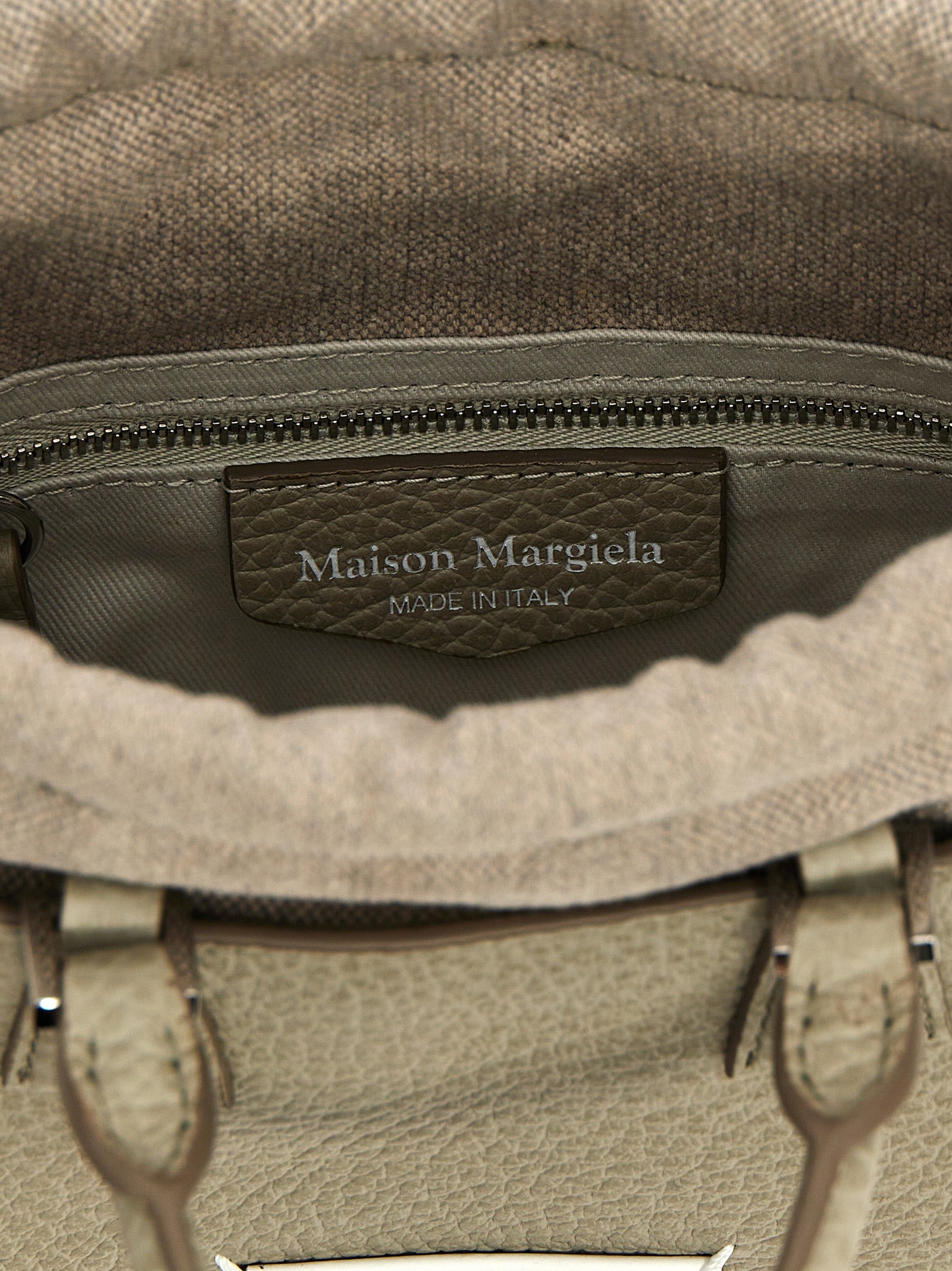 Drawstring Tote Handbag by Maison Margiela for women in calfskin leather gray features a refined silhouette, showcasing a secure drawstring, organized , and versatile shoulder-strap & handle for a refined finish.