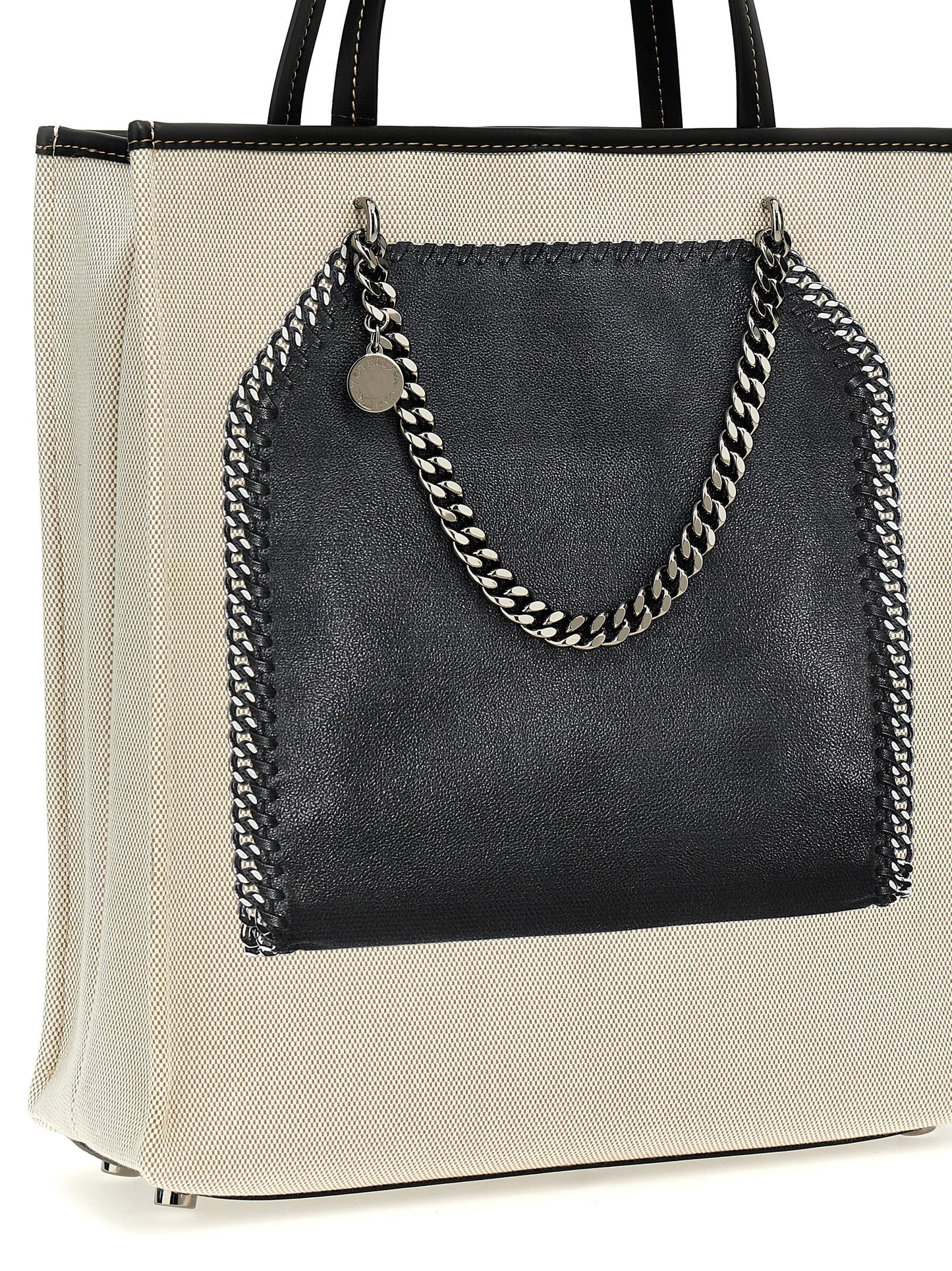 Shopper Tote Bag by Stella McCartney for women in stretch cotton modal canvas multicolor & print features a jet-set sophisticated Falabella Stretch Cotton Modal Canvas Shopper Tote Bag design with a secure hook, ample , and versatile handle for a jet-set sophisticated finish.