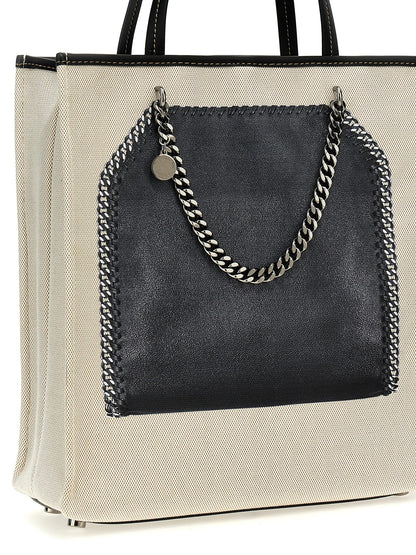 Shopper Tote Bag by Stella McCartney for women in stretch cotton modal canvas multicolor & print features a jet-set sophisticated Falabella Stretch Cotton Modal Canvas Shopper Tote Bag design with a secure hook, ample , and versatile handle for a jet-set sophisticated finish.