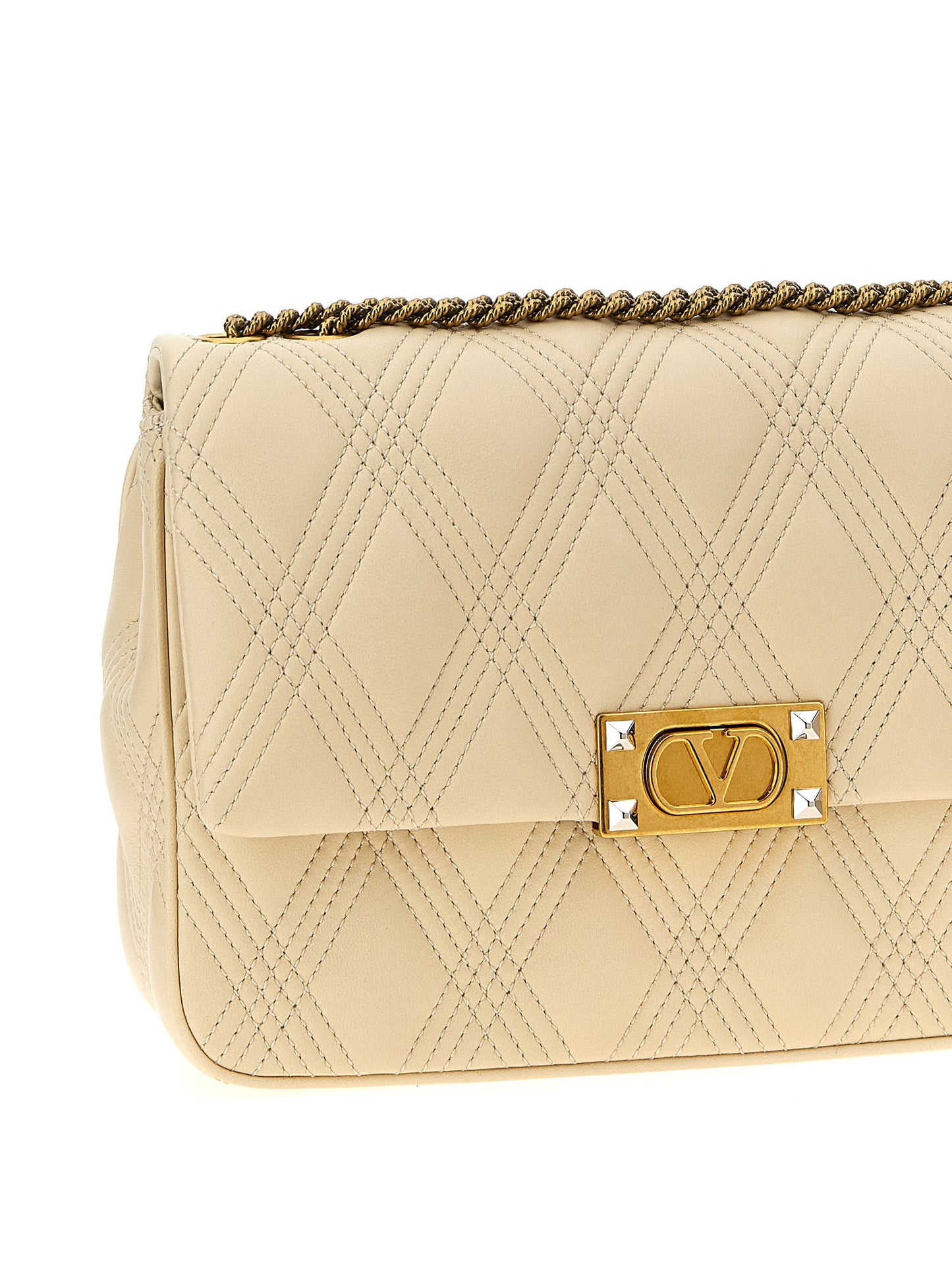 Quilted Shoulder Flap Bag by Valentino Garavani for women in lamb leather white & signature features a effortless chic silhouette with a secure flap, ample , and versatile shoulder-strap for a effortless chic finish.