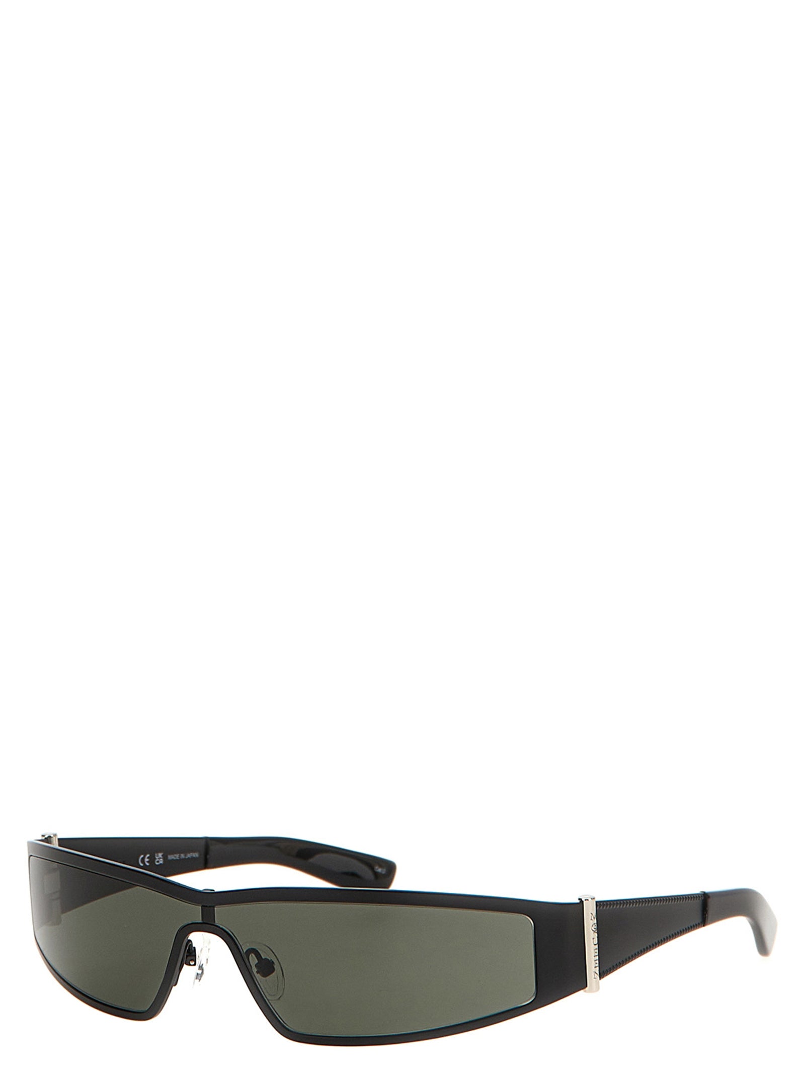 Sunglasses by Alexander McQueen for women in silk twill black showcases a ethereal silhouette, featuring black coloured frame with for a ethereal finish.