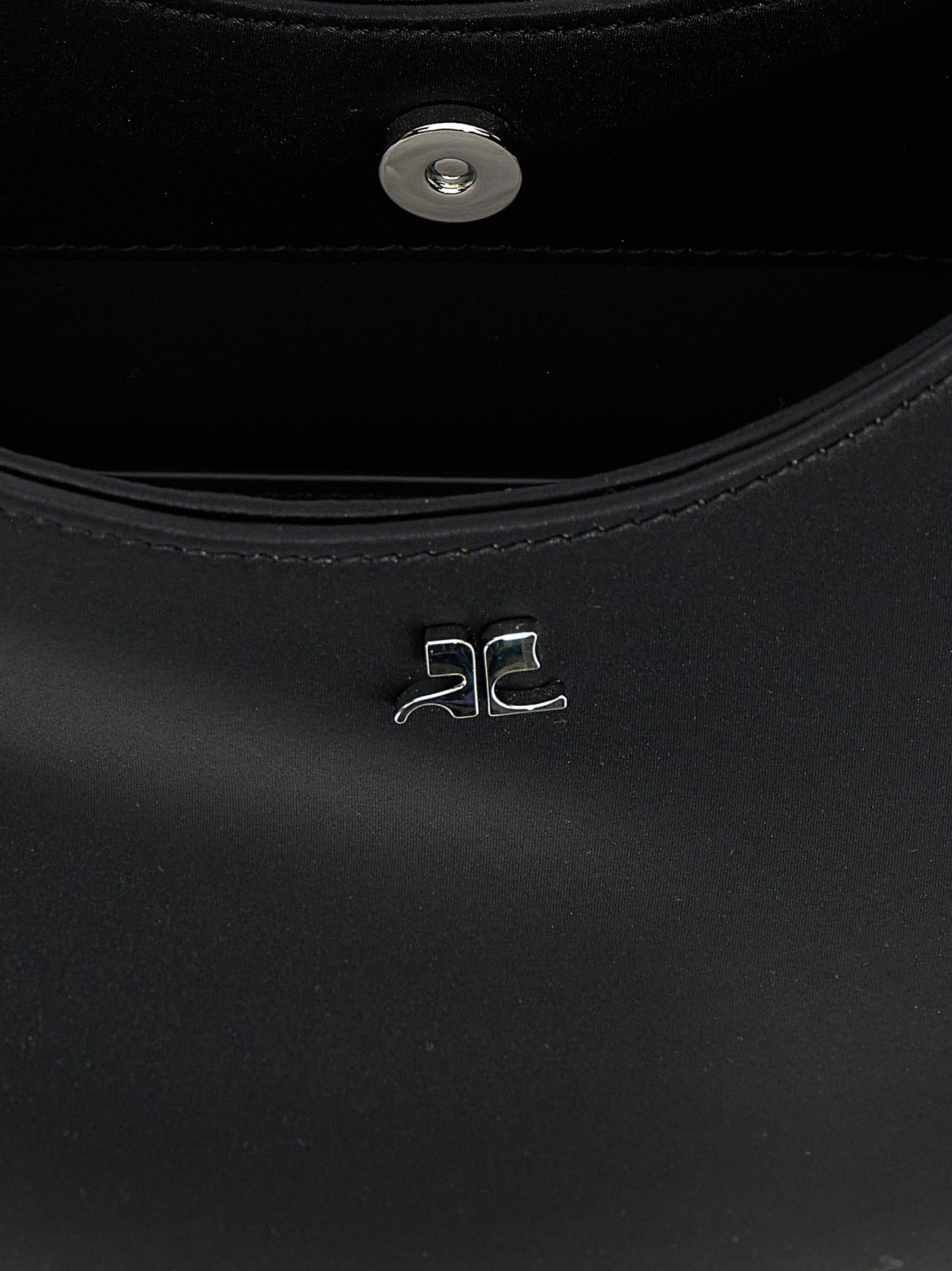 Handbag by Courrèges for women in stretch viscose black features a refined silhouette, showcasing a secure magnetic, organized , and versatile shoulder-strap, adjustable-strap & handle for a refined finish.