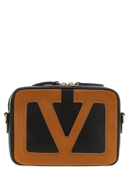 Crossbody Messenger Handbag by Valentino Garavani for unisex in polyester brown & signature features a transformative sophistication silhouette, showcasing a secure zipper, ample , and versatile crossbody-strap, shoulder-strap & adjustable-strap for a transformative sophistication look.