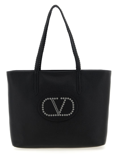 Shopper Tote Bag by Valentino Garavani for women in bos taurus calf suede leather black & signature features an jet-set-ready silhouette, showcasing the Nellcote V Logo Bos Taurus Calf Suede Leather Shopper Tote Bag design with a secure zipper, ample , and versatile handle.