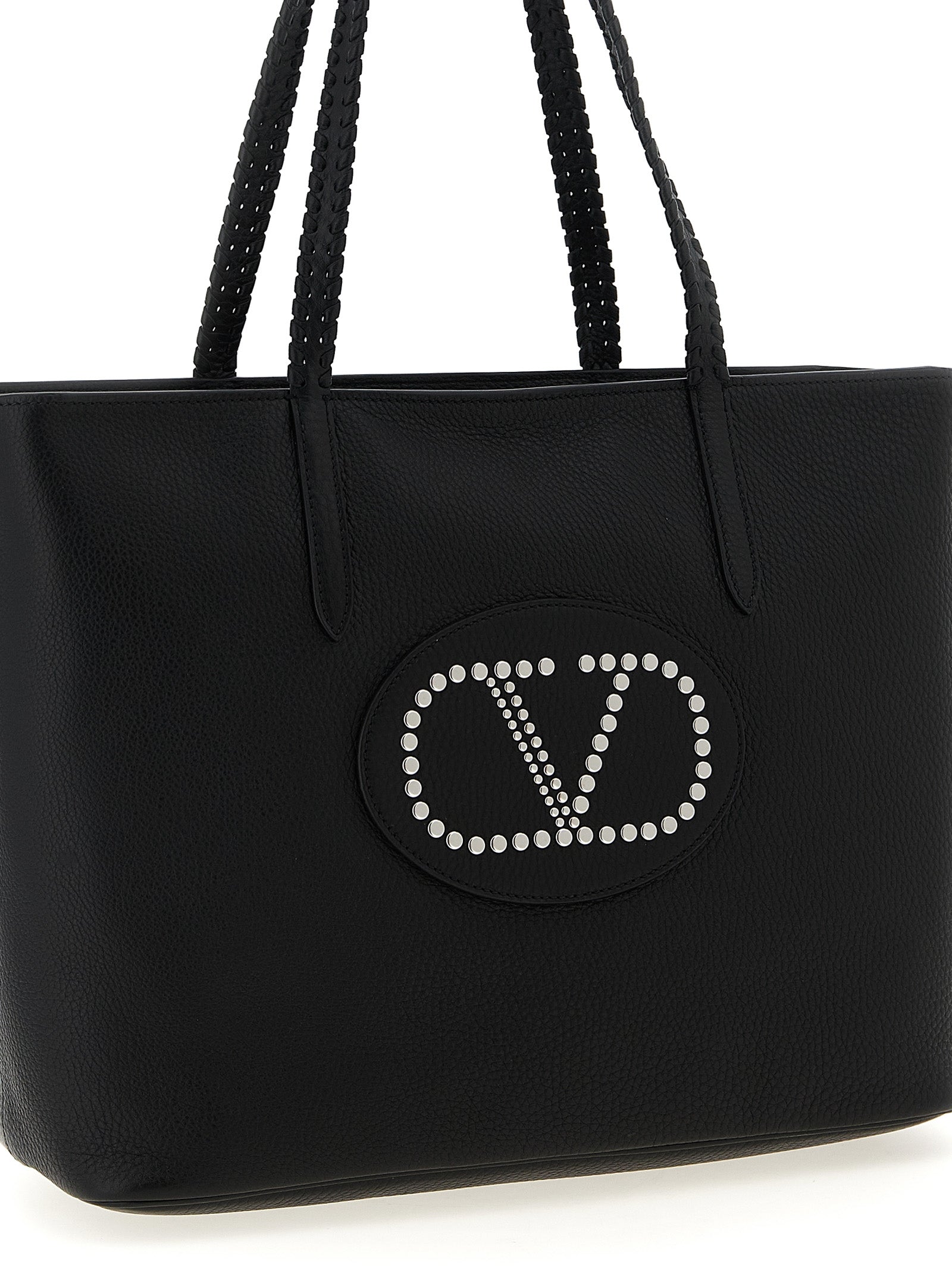 This Shopper Tote Bag by Valentino Garavani for women in bos taurus calf suede leather black & signature features an jet-set Nellcote V Logo Bos Taurus Calf Suede Leather Shopper Tote Bag design with a secure zipper, ample , and jet-set handle.