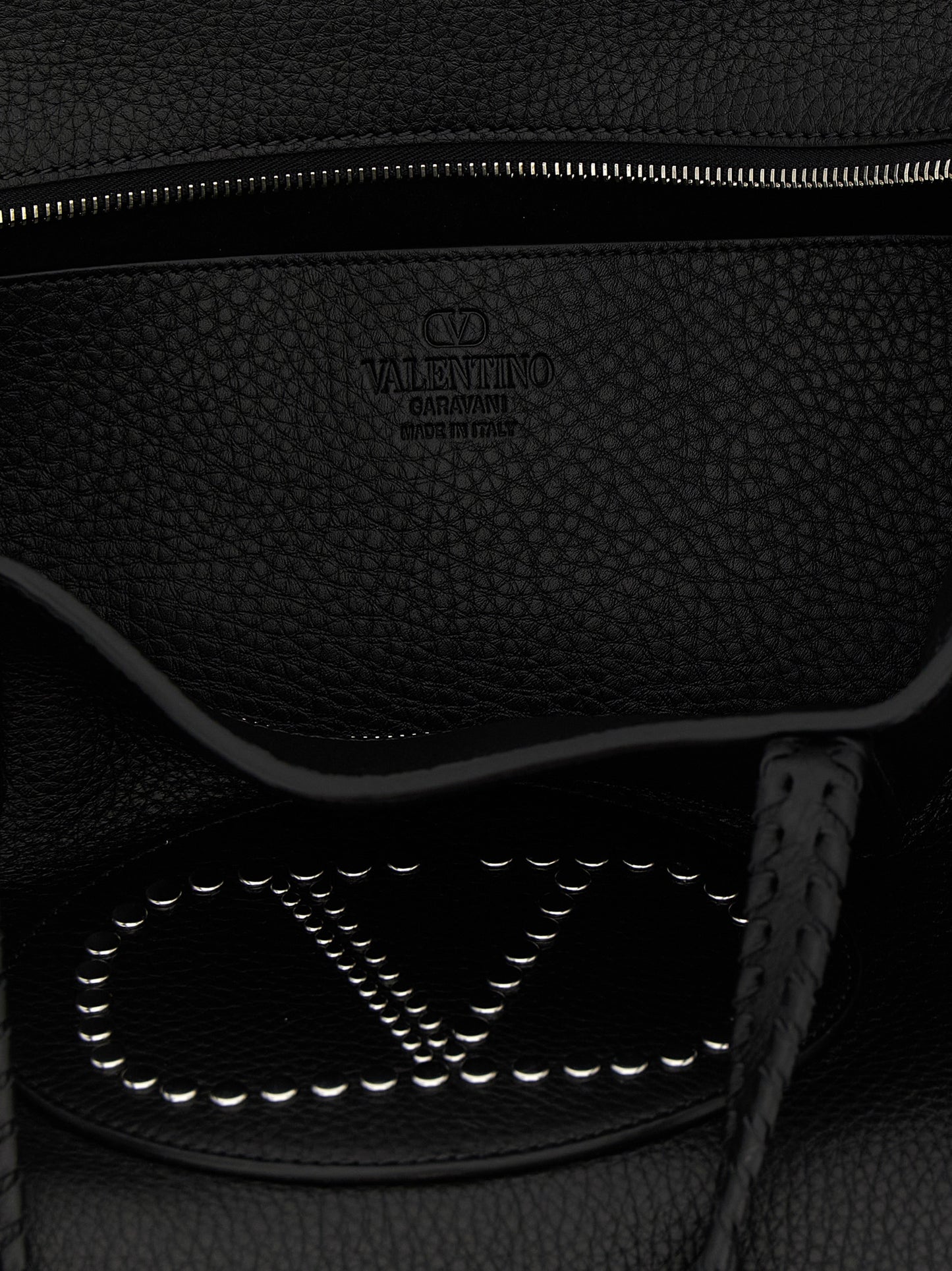 Shopper Tote Bag by Valentino Garavani for women in bos taurus calf suede leather black & signature features an jet-setting Nellcote V Logo Bos Taurus Calf Suede Leather Shopper Tote Bag design with a secure zipper, jet-setting , and versatile handle for a jet-setting look.