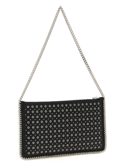 Shoulder Bag by Stella McCartney for women in polyurethane leather black & signature features a statuesque silhouette, showcasing a secure zipper and statuesque with versatile shoulder-strap & handle for a statuesque finish.