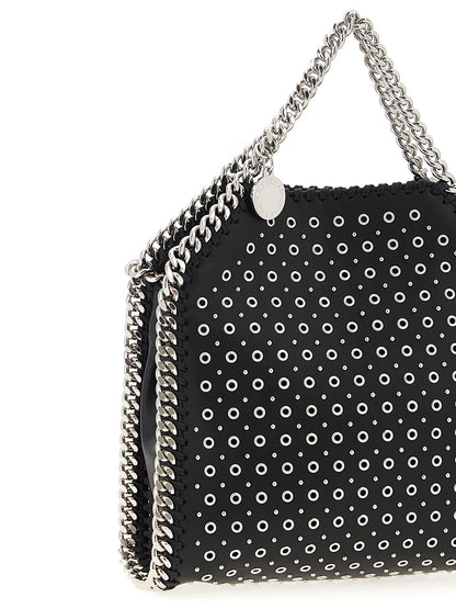 Handbag by Stella McCartney for women in polyurethane leather black features a refined silhouette, showcasing a secure magnetic, organized , and versatile shoulder-strap & handle for a refined finish.