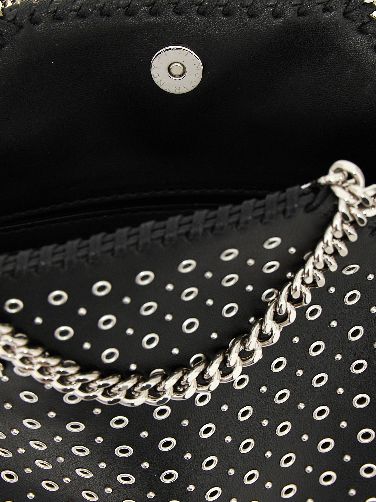 Handbag by Stella McCartney for women in polyurethane leather black features a exquisite silhouette, showcasing a secure magnetic and exquisite with versatile shoulder-strap & handle for a exquisite finish.