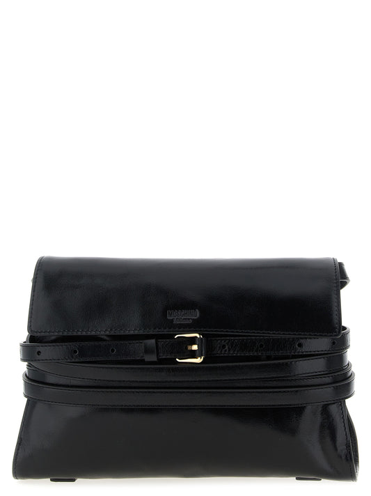 Crossbody Flap Handbag by Moschino for women in leather black features a multifaceted silhouette, showcasing a secure flap & magnetic and multifaceted with versatile crossbody-strap, shoulder-strap, adjustable-strap & belt-strap for multifaceted style.