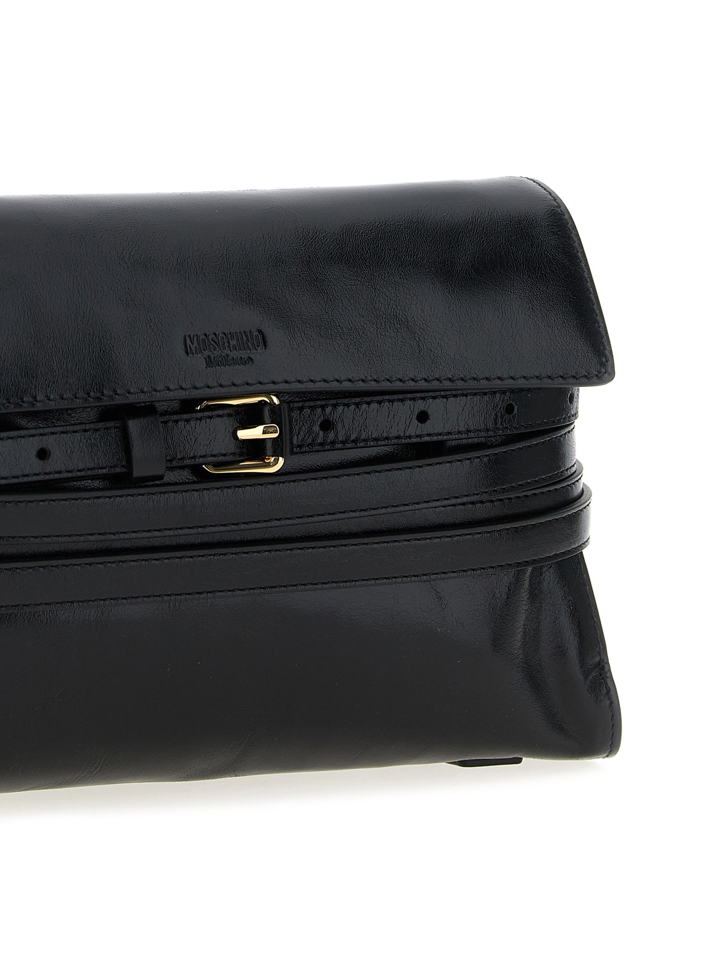 Crossbody Flap Handbag by Moschino for women in leather black features an multi-faceted design with a secure flap & magnetic, ample , and versatile crossbody-strap, shoulder-strap, adjustable-strap & belt-strap for a multi-faceted finish.
