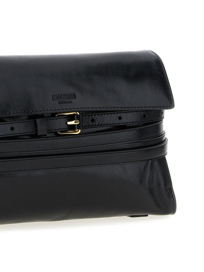 Crossbody Flap Handbag by Moschino for women in leather black features an multi-faceted design with a secure flap & magnetic, ample , and versatile crossbody-strap, shoulder-strap, adjustable-strap & belt-strap for a multi-faceted finish.
