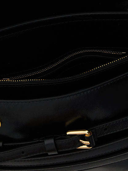Crossbody Flap Handbag by Moschino for women in leather black features a transformative sophistication silhouette, showcasing a secure flap & magnetic, ample , and versatile crossbody-strap, shoulder-strap, adjustable-strap & belt-strap for a transformative sophistication look.