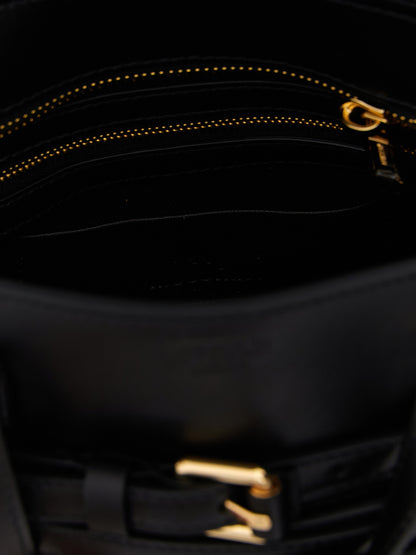 Small Handbag by Moschino for women in polyester leather black features a signature silhouette, showcasing a secure zipper and signature with versatile shoulder-strap, adjustable-strap, belt-strap & handle for a sophisticated look.