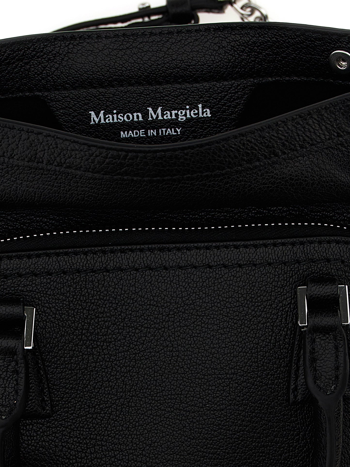 Micro Handbag by Maison Margiela for women in calfskin leather black & signature features a signature silhouette, showcasing a secure zipper and signature with versatile shoulder-strap & handle for a sophisticated look.