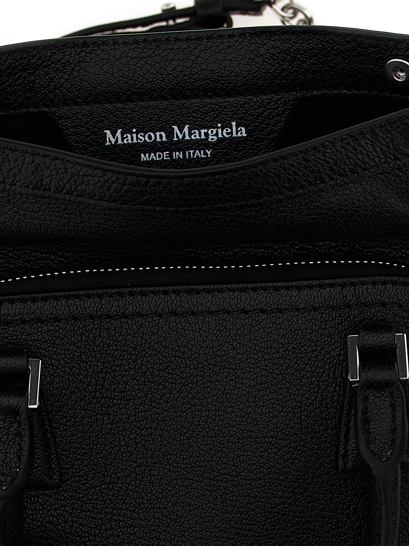 Micro Handbag by Maison Margiela for women in calfskin leather black & signature features a signature silhouette, showcasing a secure zipper and signature with versatile shoulder-strap & handle for a sophisticated look.