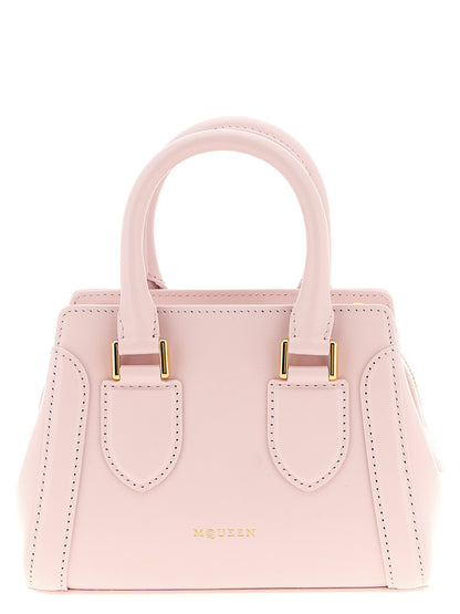 Mini Handbag by Alexander McQueen for women in calfskin leather multicolor & pink presents a ornamental silhouette, showcasing a secure zipper, ample , and versatile shoulder-strap & handle for a ornamental finish.