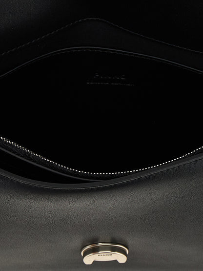 Crossbody Flap Handbag by PINKO for women in cotton & fur black features a versatile chic silhouette, meticulously detailed with a secure snap, flap & buckle, ample , and versatile crossbody-strap & shoulder-strap.