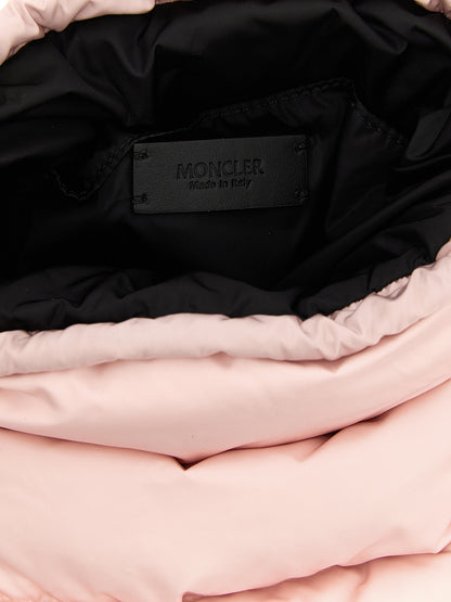 Quilted Bucket Handbag by Moncler for women in leather multicolor, pink & silver presents a ornamental silhouette, showcasing a secure drawstring, ample , and versatile shoulder-strap, adjustable-strap & handle for a ornamental finish.