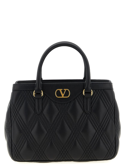 Quilted Handbag by Valentino Garavani for women in lamb leather black & signature features a exquisite silhouette, showcasing a secure and exquisite with versatile shoulder-strap, adjustable-strap & handle for a exquisite finish.